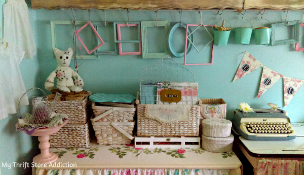 Hang supplies like frames from hooks on long curtain rods! mythriftstoreaddiction.blogspot.com Craft studio reveal