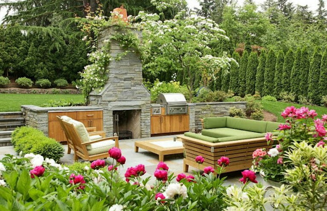 covered outdoor living spaces with fireplace