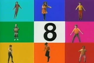 Eight children dance in a colour block grid and counting till 8. Sesame Street 123 Count with Me