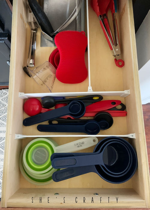 Organize kitchen drawers with adjustable drawer organizers