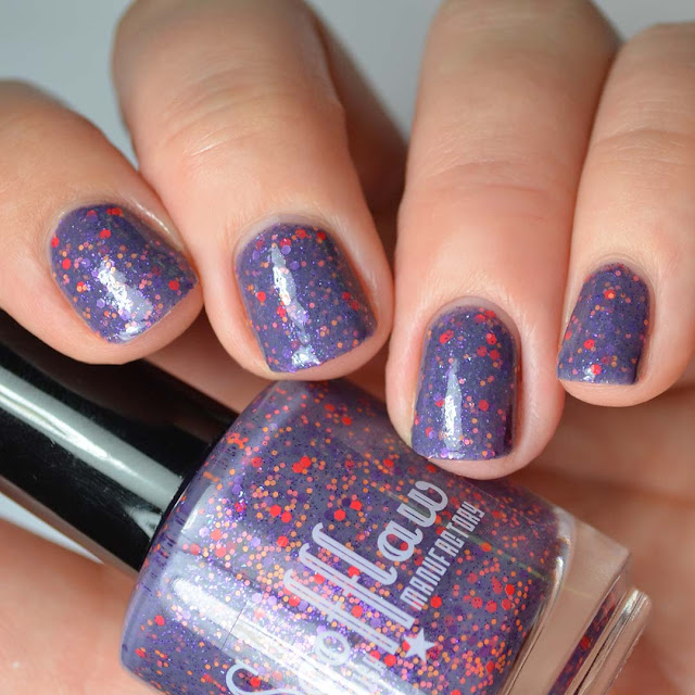 purple nail polish with purple and red glitter swatch