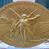 Το μετάλλιο των Ολυμπιακών Αγώνων απεικονίζει τη θεά Νίκη στο Καλλιμάρμαρο και φόντο τον Παρθενώνα