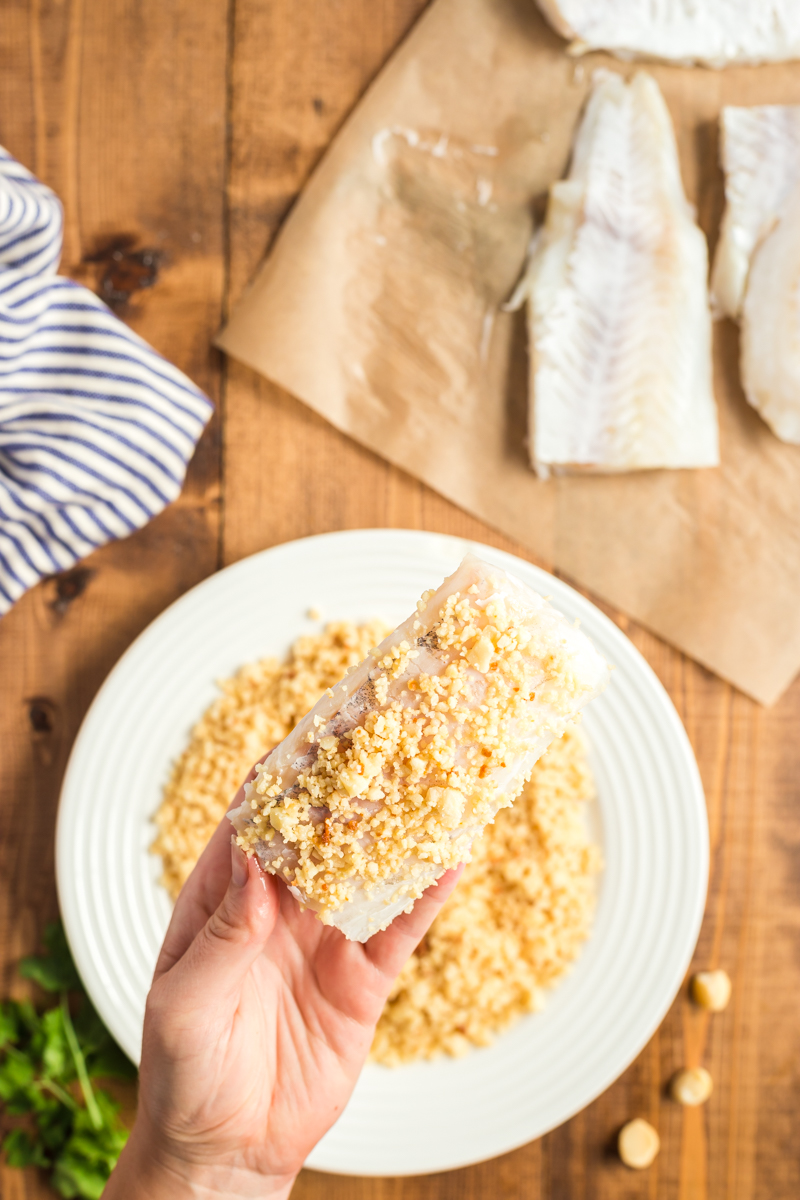 Oven Baked Coconut Macadamia Fish Fillets are a delicious fish recipe that is super simple, but fancy enough to impress company, and perfect for your low carb or keto lifestyle! The bonus is it can be made from start to finish in less than 30 minutes! #lowcarb #Keto #glutenfree #fish #cod #seafood #macadamia #coconut #sheetpan #easy #recipe | bobbiskozykitchen.com
