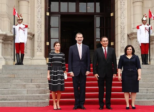 Queen Letizia wore Carolina Herrera striped fit and flare dress. Queen wore a new dress by Carolina Herrera. President Vizcarra and his wife