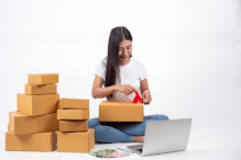 happy-woman-who-are-packing-boxes-online-sales-online-work-concept_1150-8098.jpg