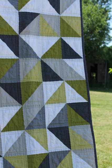 craftyblossom: grey and green geometric quilt.