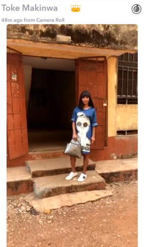 8 Toke Makinwa visits her childhood home where she lost her parents in house fire