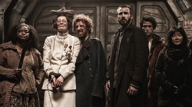 Escena con los personajes de Snowpiercer Escena con los personajes de Snowpiercer