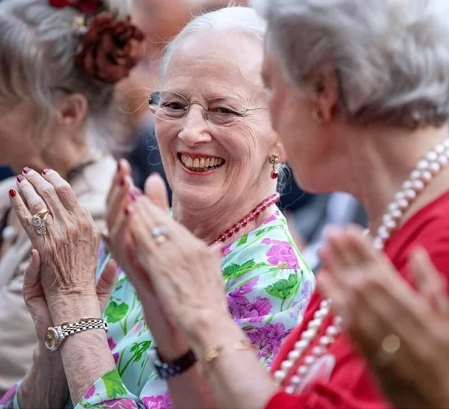 Queen Margrethe wore a green floral print chiffon dress, Princess Benedikte wore a red floral patterned dress