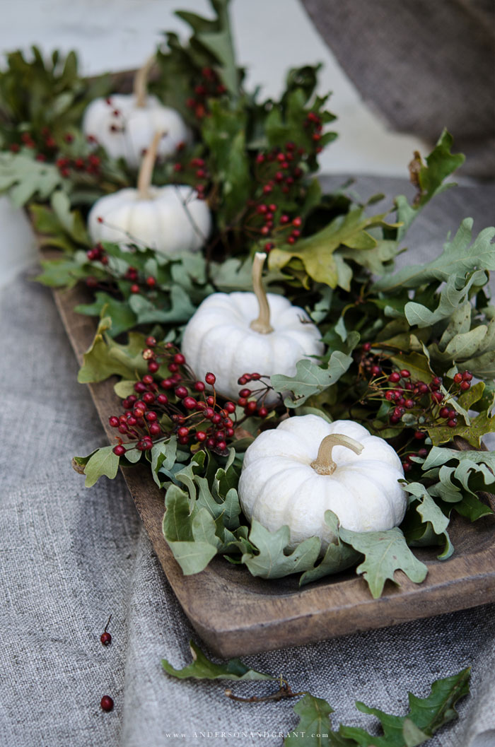 Learn to layer pieces of nature gathered outdoors to create a simple yet stylish centerpiece for your fall or Thanksgiving dinner table.  |  www.andersonandgrant.com