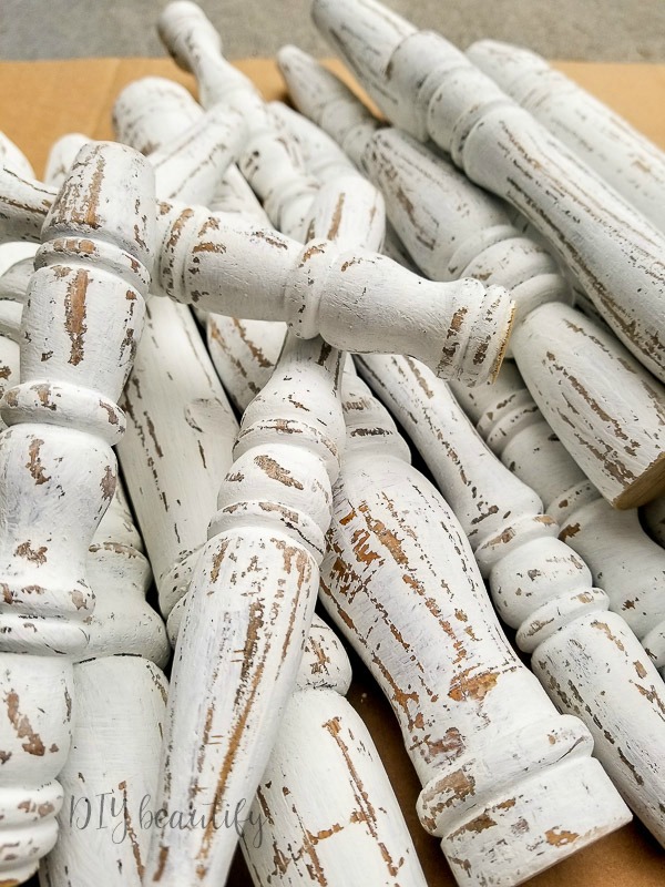 pile of chippy white spindles