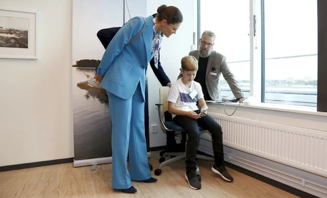 Crown Princess Victoria wore a new royal blue suit. The Princess wore a rose-garden print blouse by Camilla Thulin