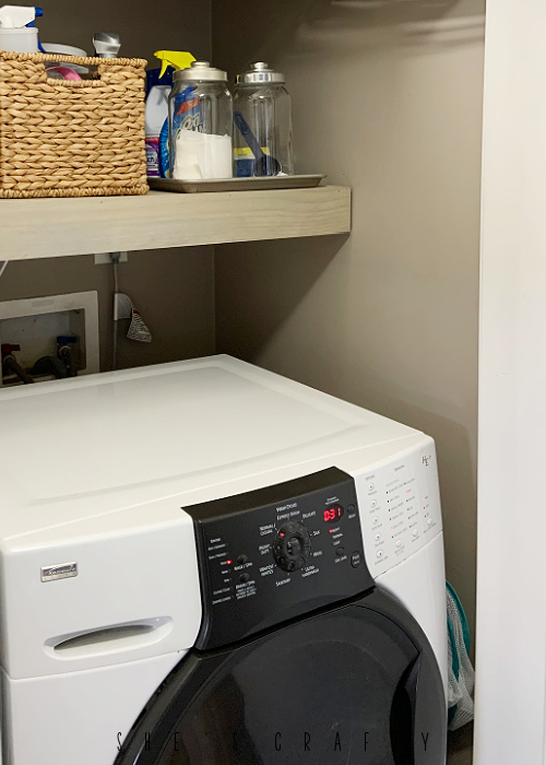 organizing ideas - hang collapsible laundry basket on command hook