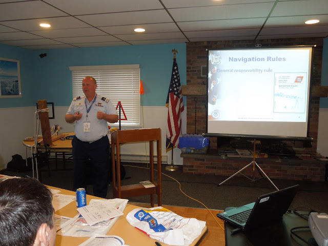 Ted Hall talking to students about avoiding collisions in a vessel.