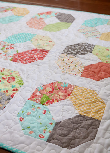 Charming Lucy a free charm pack quilt pattern from Andy of A Bright Corner