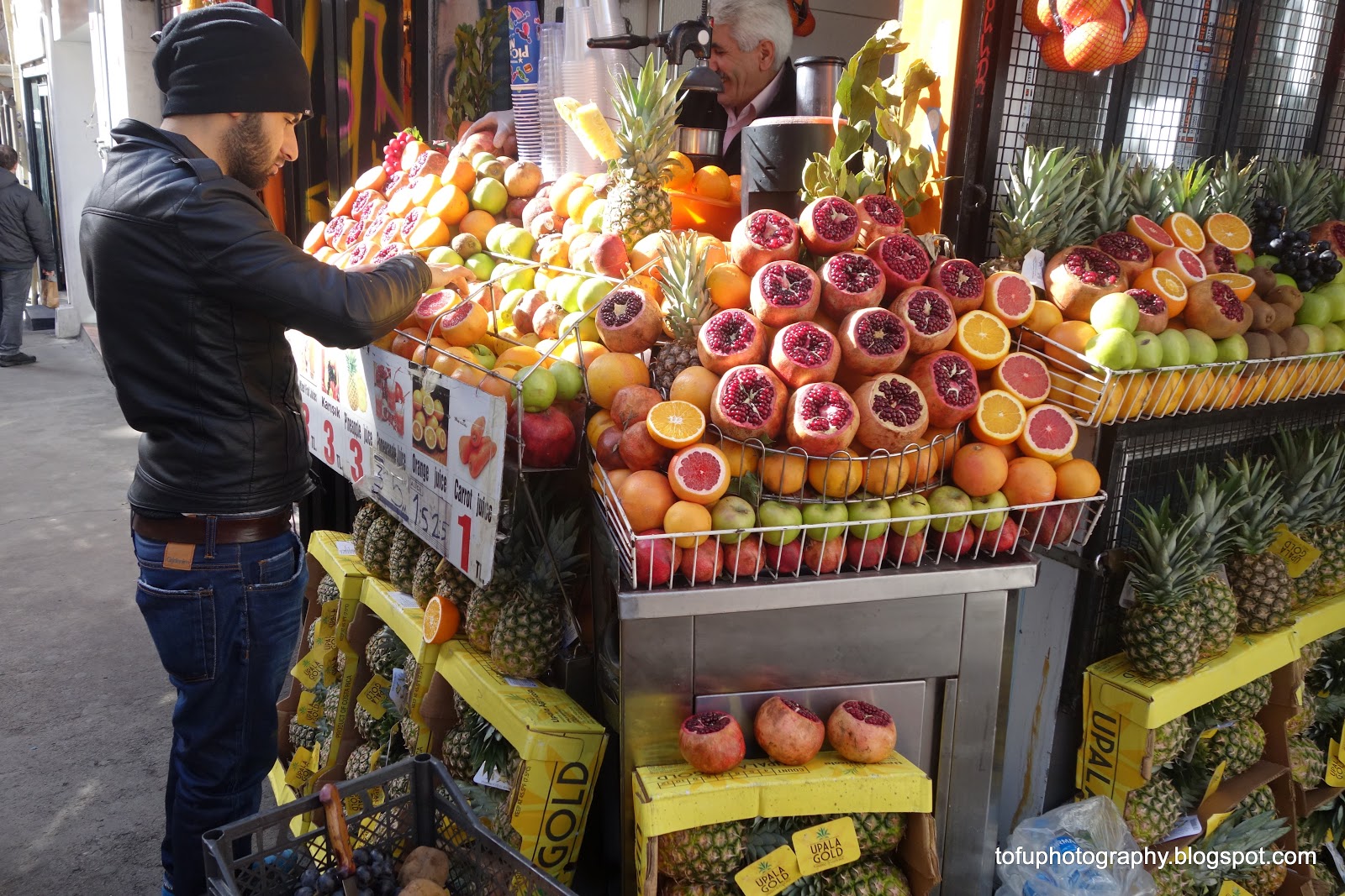 Tofu Photography Fruit stand and juice place in Istanbul, Turkey. Lots of pomegranates