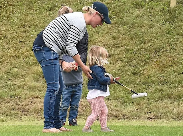 Mint Velvet Navy & Grey Stripe Zip Back Knit. Mia Tindall attends the Maserati Royal Charity Polo Trophy, Zara wore summer dress