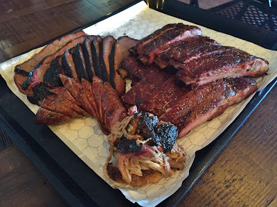 Four meats at Corkscrew BBQ: Brisket, ribs, sausage, pulled pork.