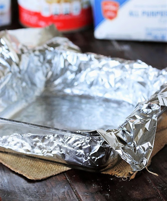 Foil Sling in Baking Dish to Make Raspberry-Almond Bars Image