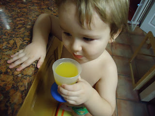 Baby Boy with some Freshly Squeezed Orange Juice