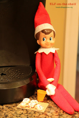 We made our little donuts with cheerios, marshmallow icing and sprinkles. The cup is a thimble. Ideas for Christmas Fun with your Elf-on-the-Shelf