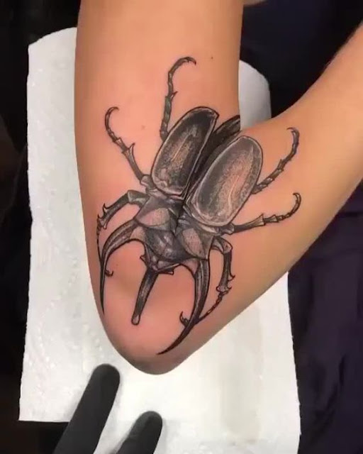 bug tattoo
