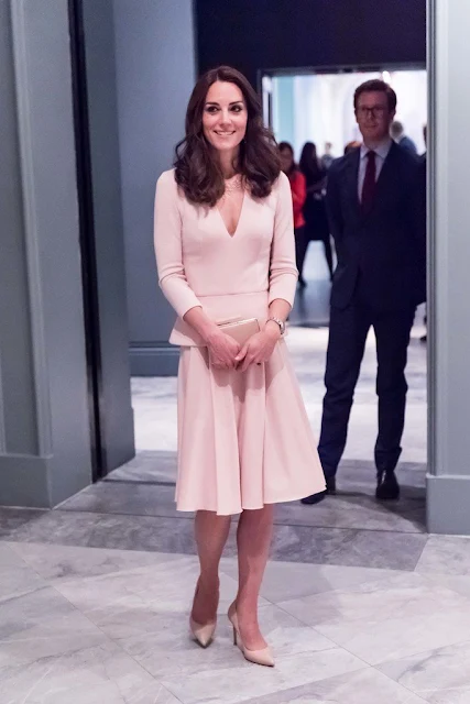 Kate Middleton visits the 'Vogue 100' exhibition. Kate Middleton wore her Alexander McQueen Wool and Cashmere Blend Dress