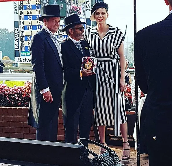 Princess Charlene Ladies Race Day that held at the Turffontein Racecourse in Johannesburg. Princess Charlene wore Akris dress