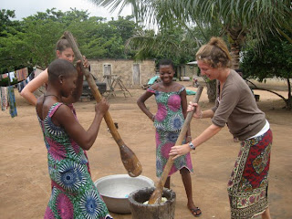 Emily with community members in Benin