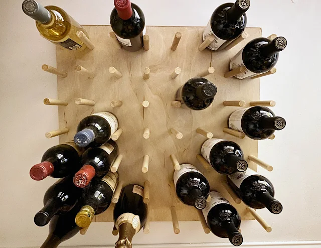 DIY oversized wall mount pegboard wine rack