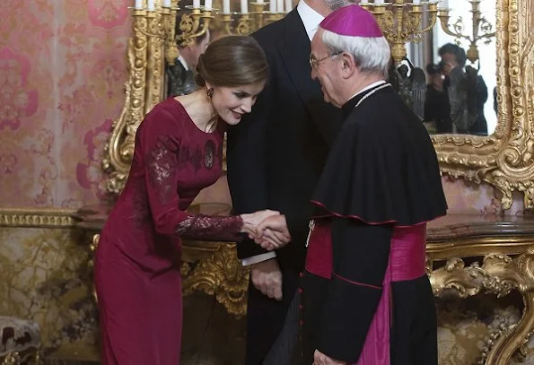 Queen Letizia attends the annual Foreign Ambassadors reception at the Royal Palace. Queen Letizia wore Felipe Varela Long sleeve dress in red diamond earrings