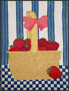 needlepoint of a basket of strawberries