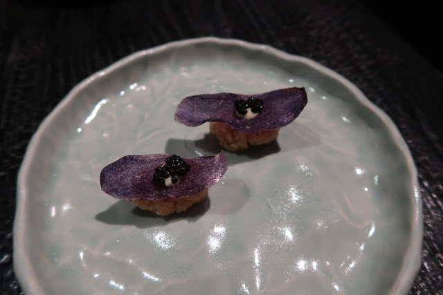 Robin: Caviar atop a toro potato chip Hayes Valley's Robin serves unique nigiri, including this caviar atop a taro chip, rested above a bed of rice.