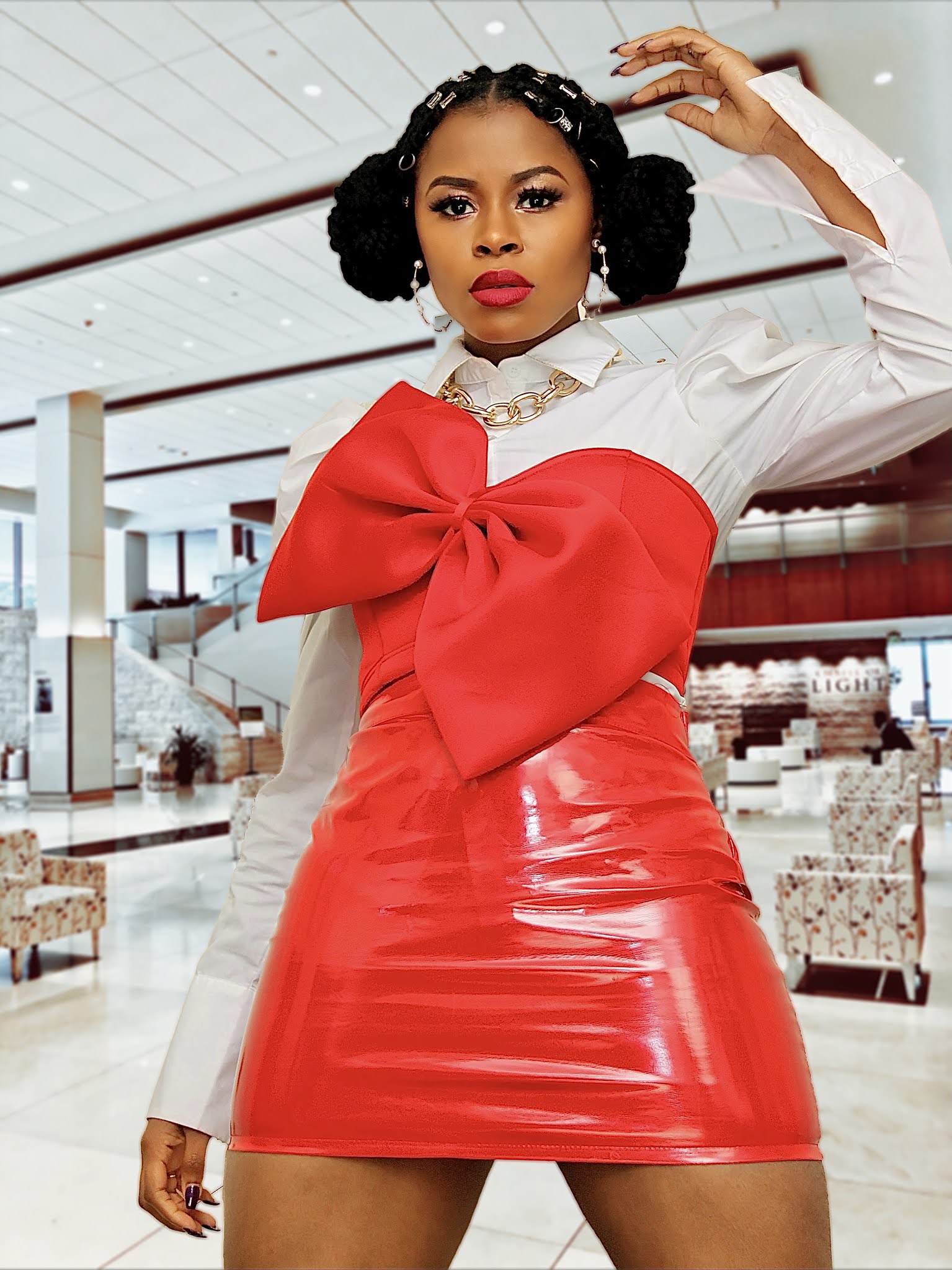 Valentine's day outfit A female wearing white button down shirt and oversized red bow crop top.