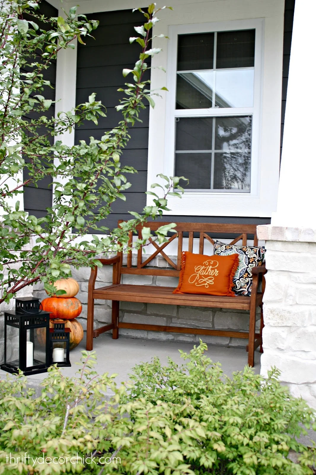 Wood bench on porch fall decor