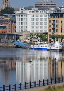 A shimmering reflection in the River Tyne of the Malmaison Hotel