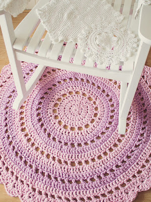 http://crafts.tutsplus.com/tutorials/crochet-an-amazing-mandala-floor-rug--craft-6032