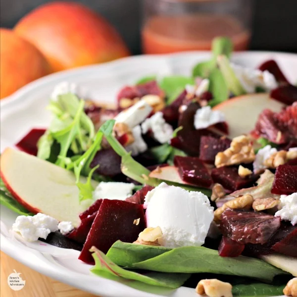 Blood Orange, Beet, and Apple Salad with Goat Cheese and Citrus Honey Vinaigrette | by Renee's Kitchen Adventures - easy meatless salad recipe with a recipe for homemade dressing made with citrus and honey #SundaySupper #RKArecipes