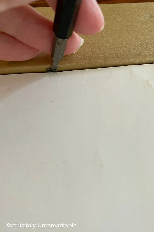 Closing Metal Pins On  A Frame