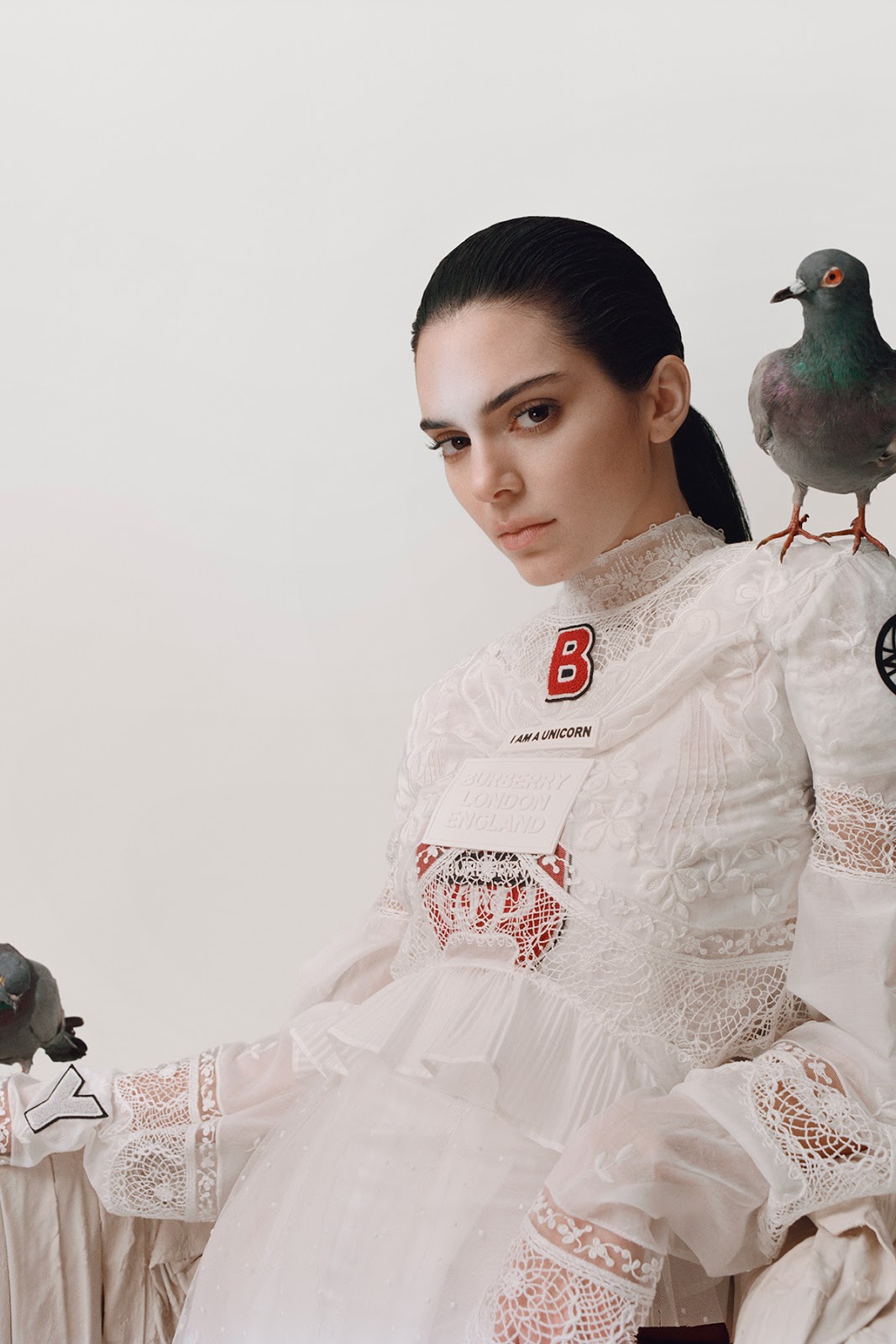 KENDALL JENNER TRANSFORMS INTO MAURIZIO CATTELAN'S ARTWORK FOR 'GARAGE