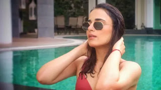Radhika-madan-shares-hot-bikini-photos-in-swimming-pool-from-secret-holiday