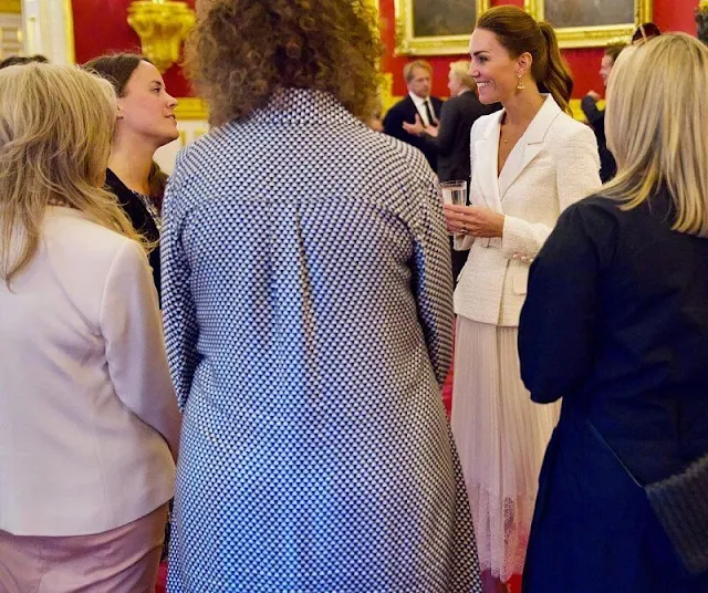 Kate Middleton wore a new cream tailored boucle and chiffon midi dress from Self Portrait