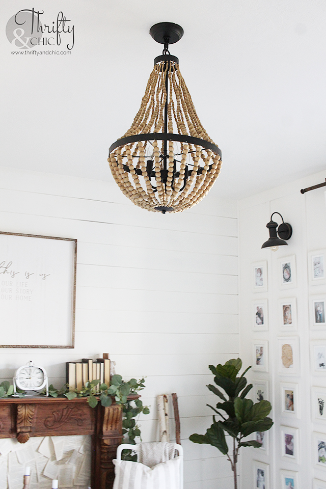 Beaded chandelier. World Market beaded chandelier. Neutral living room decor and decorating ideas. Farmhouse living room decor. Living room chandelier ideas. Board and batten and shiplap walls. cottage living room decor. White living room decor. Boho style living room decor.  