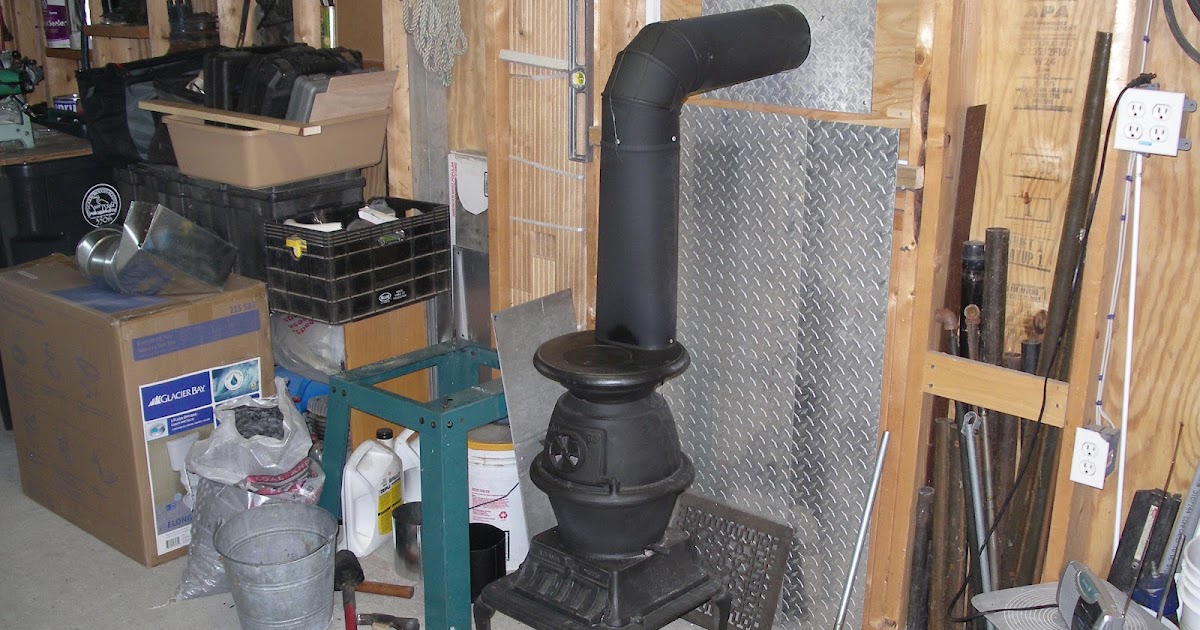Nails and Sawdust Cobbling together a new wood stove out of a propane