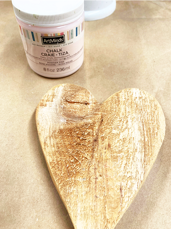 wooden heart and light pink paint