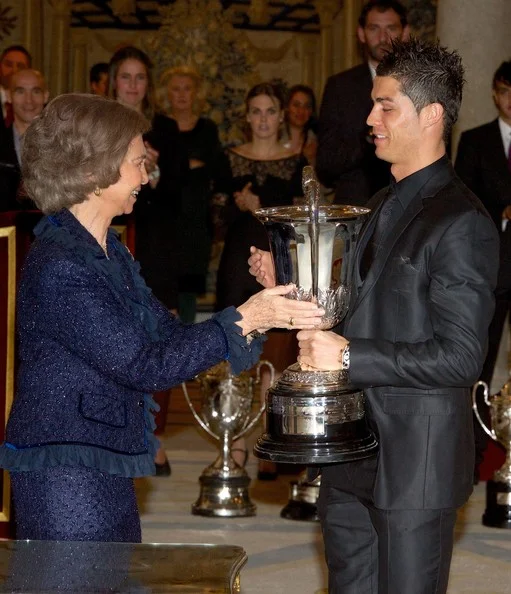 Queen Sofia presents Real Madrid's player Cristiano Ronaldo with the Ibero-American Community Trophy