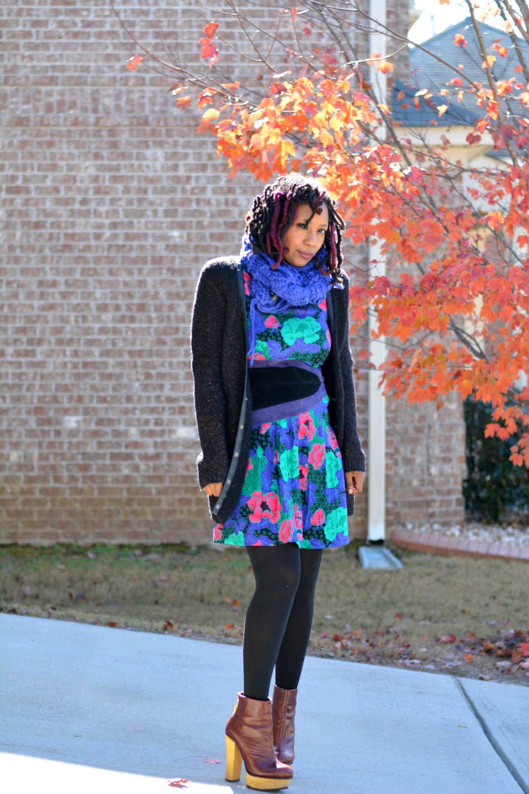 vintage floral dress worn with a sweater