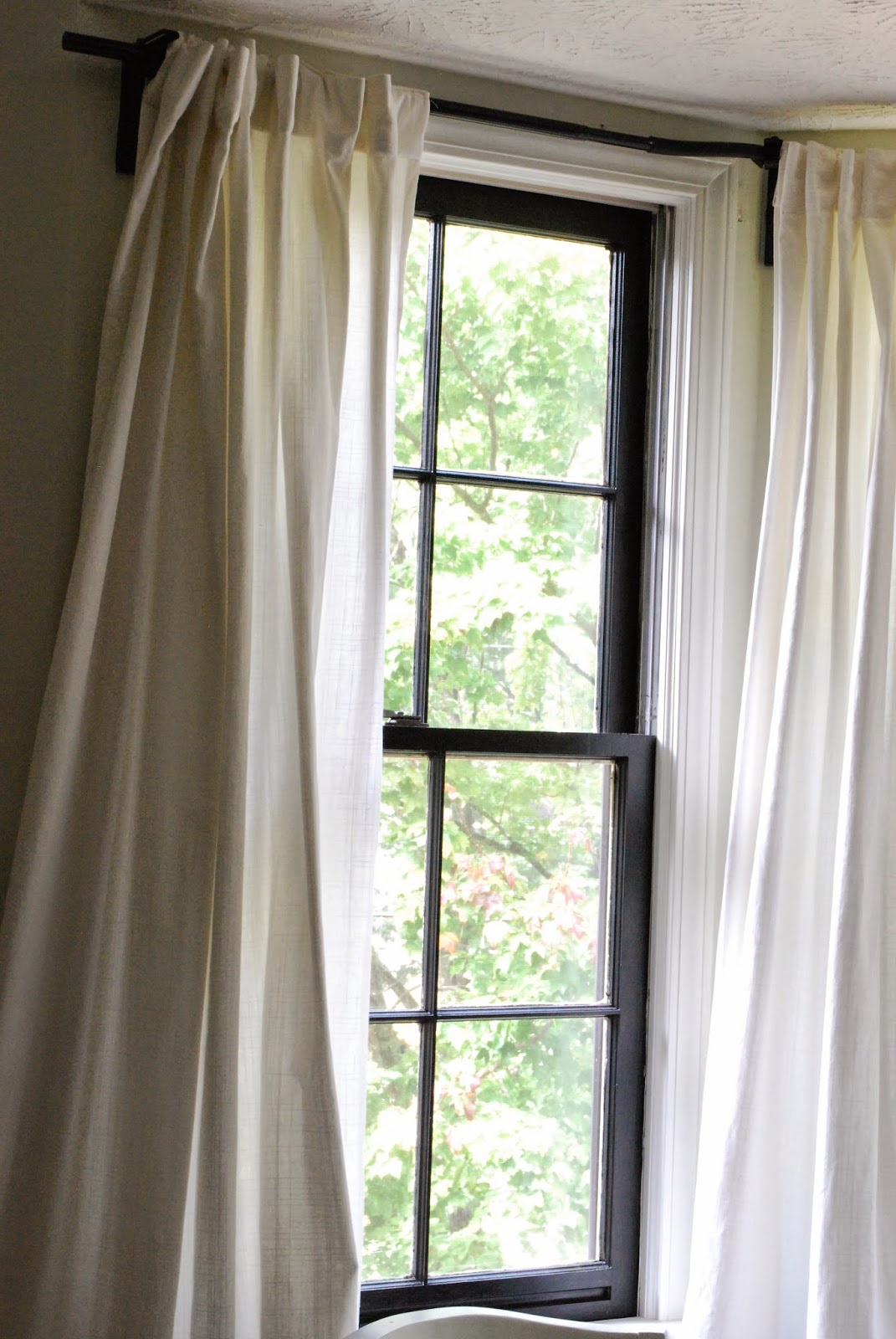 Between Blue and Yellow Bay window curtain rod