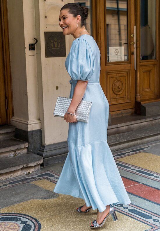 Crown Princess Victoria wore a new metallic crepe puff sleeve midi dress from & Other Stories, and sandals from H&M