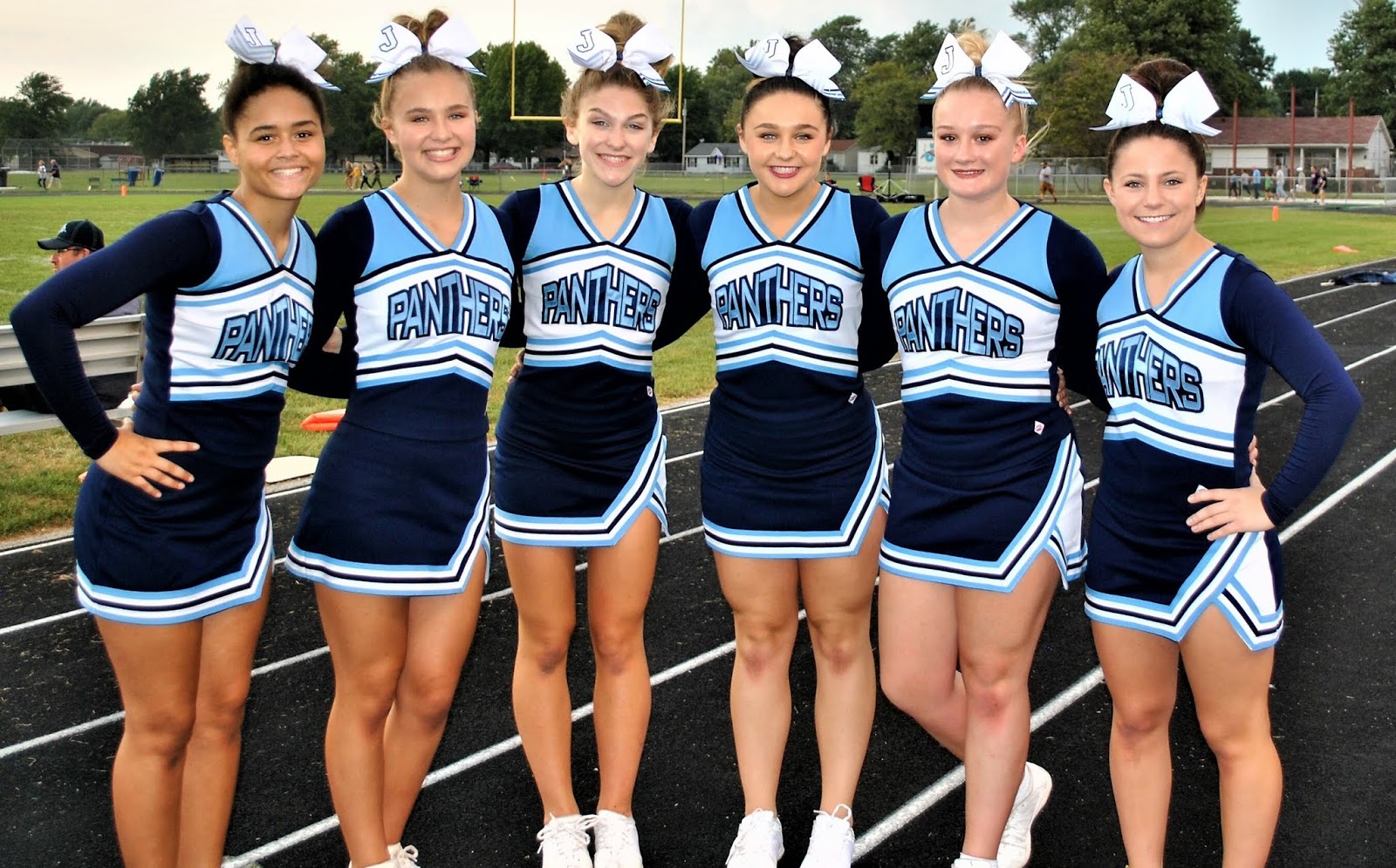 HOME OF THE JERSEY PANTHERS Cheerleaders/Blue Crew/Mascot